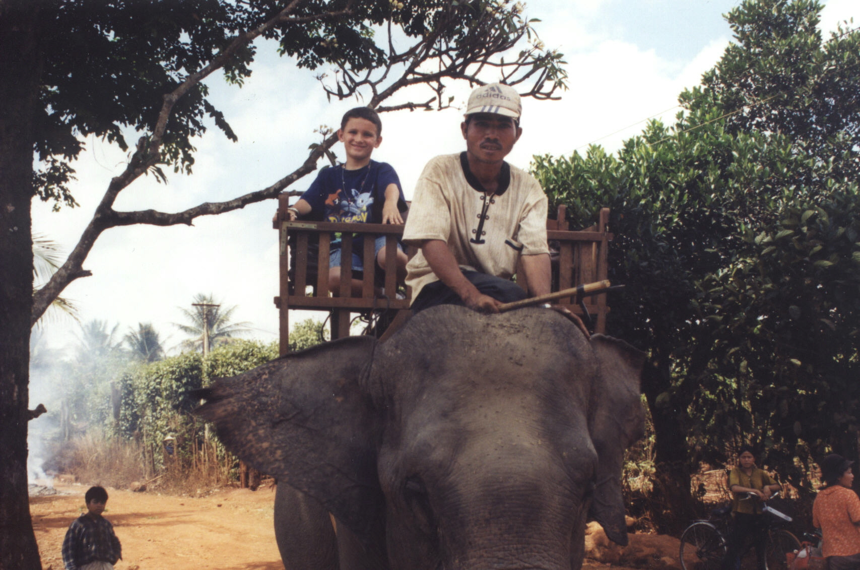 Sean riding on an elephant