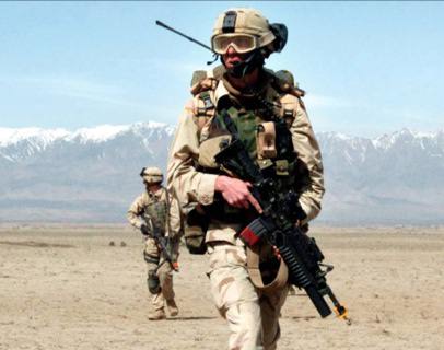 troops practice training with blank
adapters in combat zone