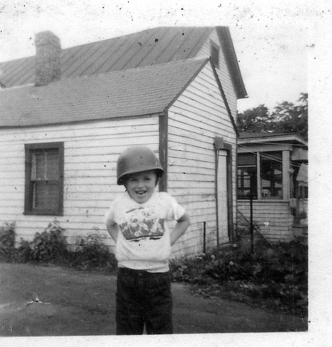 author as a child with helmet